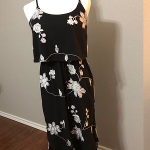 Black strappy dress with white flowers